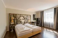 Hotel Calmo Hotel in zona SMA Sales Manager Akademie am Studienzentrum Hohe Warte