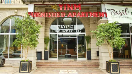 Yinm Furnished Apartment Отели рядом с достопримечательностью «AU Conference Center»