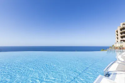 Gloria Palace Royal Hotel & Spa Hotels near Amadores Beach