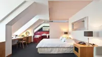 Hotel-Résidence am Klouschter Hotels in Штадтбредімю