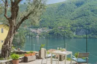 La Quiete with Private Garden by Rent All Como Hôtels à : Carate Urio