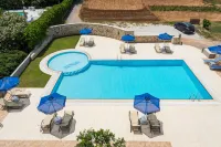 Irini Stalos Apartments - Beach