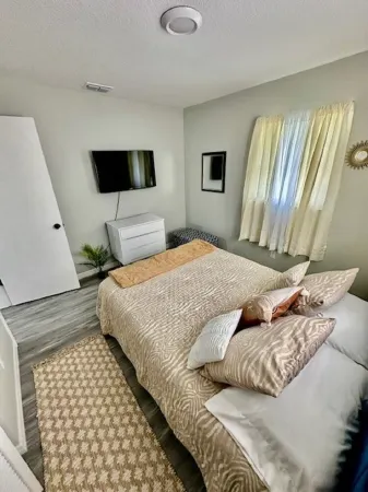 Charming 2-bedroom remodel house in welcoming St. Cloud with WiFi, AC