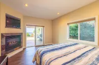 Dramatic oceanfront views. Open high ceilings. Huge deck & walls of windows!