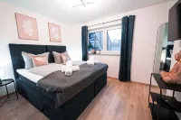 Mihalca® | Garden Suite Bibertal Hotel in zona Q1