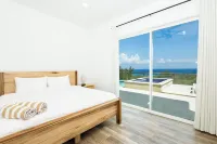 NEW! Lux Remote Escape w/ Concierge, Pool, Hot Tub, Views, Beach & Water Sports Hotels near Roatan, Honduras