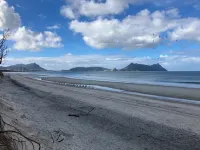 Kiwi Bach Plus Cabin with Room for Tents and Boat Hotels in Ruakaka