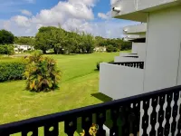 Peaceful intensely clean unit overlooking tropical gardens and golf course