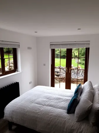 Traditional Irish cottage with views of Slieve Patrick Отели рядом с достопримечательностью «Даунпатрик энд Вниз Рейлуэй»