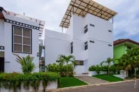 Steps from beach with private pool, rooftop terrace & swim up bar beach club!
