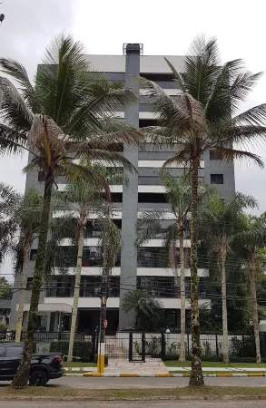 Apt. High standard on the Riviera; 200m from the beach; Air conditioning; 3 bedrooms/2 suites. Отели рядом с достопримечательностью «Praia Bertioga»