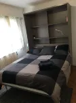 Cosy studio, close to the beach, real bed and parking