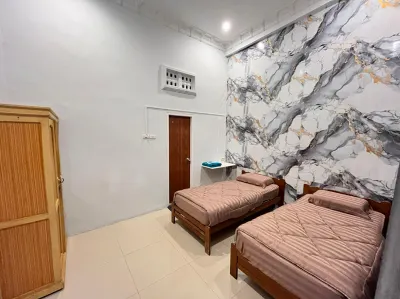 Penginapan Gedung Putih Syariah Hotel dekat Andalas Fried Chicken