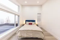 “Wake up to endless horizons—where ocean waves meet city lights