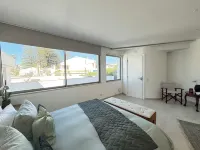 Luxury Villa Steps from the Beach | Heated Pool, Ocean Views & Rooftop Lounge