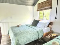 Charming 1-bedroom chalet in lush Poas with cascading pools & raw nature  WiFi Hotels in Poas