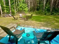 10 acres of woodland PRIVACY:  charming 3-bedroom home by Manistee w/ WiFi, AC Hotels in Filer Charter Township