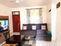 Centrally located 2-bedroom apartment/WiFi & basement parking in vibrant Mombasa