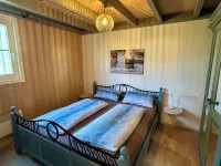 Vacation home with water terrace incl. additional costs - with sauna and fireplace Hotels in Wendisch Rietz