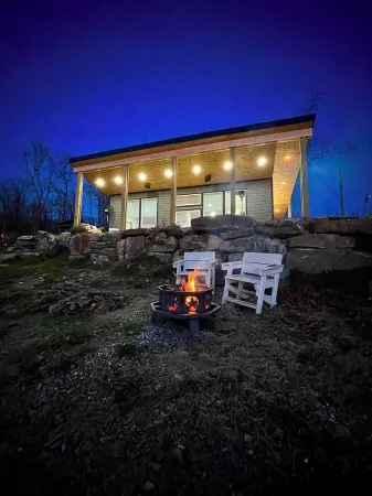Beautiful modern cabin on top of the mountain with stunning sunset views.