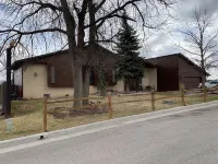 3,900 sq ft house with a big deck and a great view of the hills and canyon lake