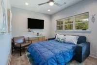 New cottage blocks from the beach; pets OK! Firepit!  Grill! EV Charger! 65” TV