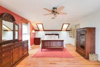 Coan River Cottage w/ Fire Pit, Pool, Movie Room