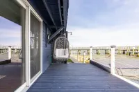 River front with large decks and dock over the Hudson