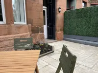 Stunning 2-bed flat with private patio in heart of the west end