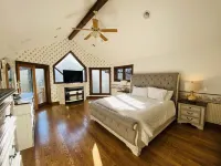 10,000 Sq. Ft. Home on 15 hunting acres with an in-door pool and sauna