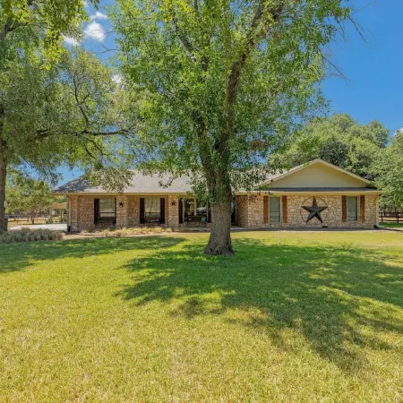 Beautiful Pool home on 2.5 acres with a serene country feel with urban location