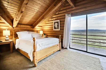 LOG HOME PRIVACY! STUNNING VIEWS ~ 8 MIN TO SKI~ TRAILS ON THE PROPERTY