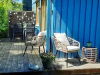 Vacation home with barrel sauna, fireplace and massage chair.