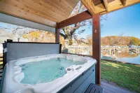 Unwind in Riverfront Comfort — Hot Tub, Fire Pit, Boat Slip, Kayaks