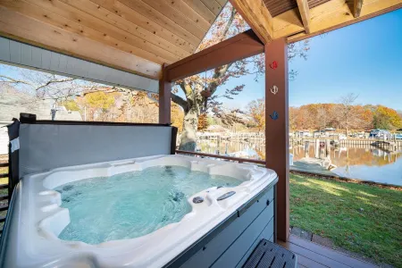 Unwind in Riverfront Comfort — Hot Tub, Fire Pit, Boat Slip, Kayaks
