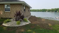 Beautiful Lake House with 150' sandy beach on 85 acre all sports lake