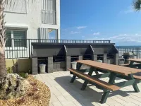 beachside condo with ocean and river views, new pool & onsite beach access