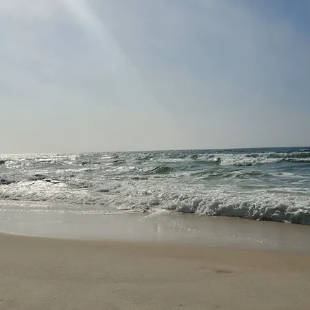 Top Floor Corner Condo with sweeping views of Perdido Key 100ft to the Beach!