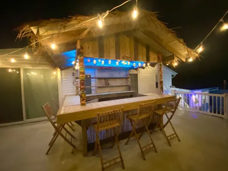 POOL, TIKI BAR, WATERFRONT  home, 8 LBI Beach passes in Mystic Island NJ