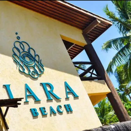 Iara Beach Hotel Boutique Отели рядом с достопримечательностью «Пляж Итапуа»