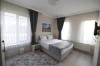 트리고 호텔 Tekelli Mahallesi 호텔