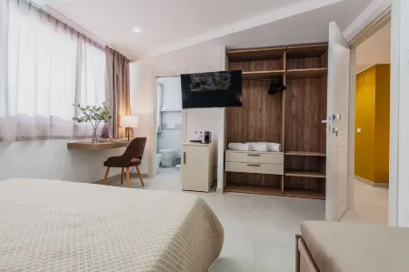 Archimede's Rooms Отели рядом с достопримечательностью «Piccolo Teatro dei Pupi»