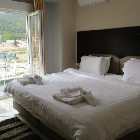 Kyknos de Luxe Suites & Rooms