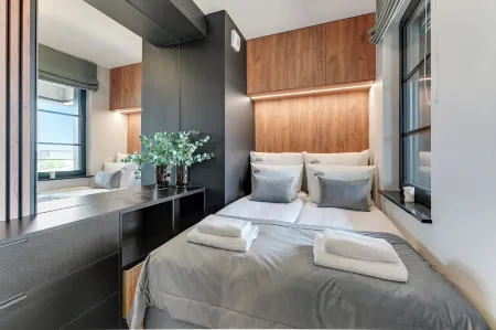 Downtown Apartments Doki Living - Foodhall & Parking Отели рядом с достопримечательностью «Гданьский политехнический университет»