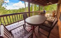 Luxurious Cabin with Scenic Porches and Modern Amenities - Charming Retreat