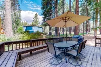 Forest-view cabin with woodstove & furnished deck - walk to golf course