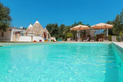 Fantastic Trulli Olea with Pool Garden Hotel in zona pOrto Guaceto - Orto Giardino