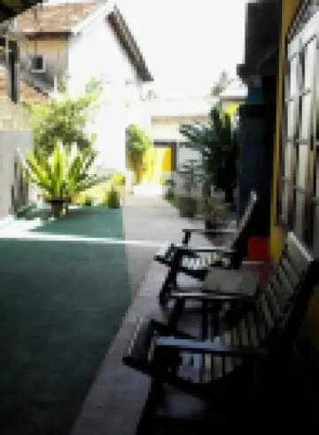 Malika's Yellow House