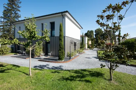 Domaine de Larchey Отели в г. Табанак