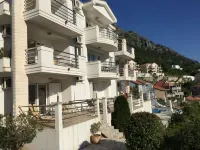 Ground Floor. Private Terrace, Shared Pool, Views across Fjord to Kotor Old Town Hotels in Muo